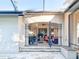 Outdoor patio area provides a perfect space for entertaining with access to the enclosed pool at 6801 S Sparkman St, Tampa, FL 33616