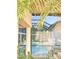 Gorgeous view of the screened in pool from inside the home at 6801 S Sparkman St, Tampa, FL 33616