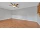 Bedroom with hardwood floors and a ceiling fan at 705 1St Ct, Palm Harbor, FL 34684