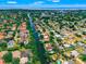Aerial view of a waterfront community featuring private boat docks with direct access to the bay and ocean at 715 45Th Ne Ave, St Petersburg, FL 33703