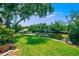 Beautiful backyard featuring a serene waterfront view and a private boat dock at 715 45Th Ne Ave, St Petersburg, FL 33703