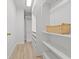 Spacious walk-in closet with custom shelving and storage solutions at 715 45Th Ne Ave, St Petersburg, FL 33703