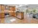 Open kitchen with granite countertops, stainless steel appliances, and ample cabinet space at 715 45Th Ne Ave, St Petersburg, FL 33703