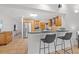Open kitchen area featuring modern appliances, granite counters, and bar stool seating at 715 45Th Ne Ave, St Petersburg, FL 33703