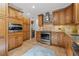 Updated kitchen boasting custom cabinets, granite countertops, and stainless steel appliances at 715 45Th Ne Ave, St Petersburg, FL 33703