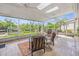 Relaxing screened porch with comfortable seating and a beautiful waterfront view, creating a serene outdoor living space at 715 45Th Ne Ave, St Petersburg, FL 33703