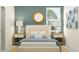 Serene bedroom featuring a comfortable bed with plush pillows and stylish decor at 7528 E 116Th St, Palmetto, FL 34221