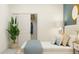 Cozy bedroom featuring a comfortable bed, side tables, and closet at 7528 E 116Th St, Palmetto, FL 34221