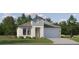 Charming single-Gathering home with a two-car garage and well-maintained lawn at 7542 E 117Th Ln, Palmetto, FL 34221