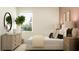 Calm primary bedroom with a modern style, wooden nightstands, and a comfortable bed at 7542 E 117Th Ln, Palmetto, FL 34221