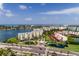 Aerial view of the community showcasing waterfront access and lush landscaping at 7932 Sailboat Key S Blvd # 506, South Pasadena, FL 33707