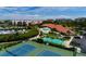 Aerial view of community recreational facilities, including tennis and shuffleboard courts at 7932 Sailboat Key S Blvd # 506, South Pasadena, FL 33707