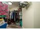 Spacious walk-in closet offering plenty of storage and organization solutions at 7932 Sailboat Key S Blvd # 506, South Pasadena, FL 33707