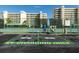 Community amenities including tennis court and EV charging stations for electric vehicles at 7932 Sailboat Key S Blvd # 506, South Pasadena, FL 33707