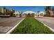 Well-maintained community entrance with manicured landscaping and covered entryways at 7932 Sailboat Key S Blvd # 506, South Pasadena, FL 33707
