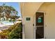 Exterior entrance to the men's gym, beside the outdoor pool with lounge seating at 7932 Sailboat Key S Blvd # 506, South Pasadena, FL 33707