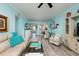 Open concept living area features dining area and a glimpse of the balcony at 7932 Sailboat Key S Blvd # 506, South Pasadena, FL 33707