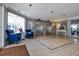 Condo lobby featuring tile floors, chairs, and access to elevators at 7932 Sailboat Key S Blvd # 506, South Pasadena, FL 33707