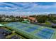 Aerial view of tennis courts at the condo community at 7932 Sailboat Key S Blvd # 506, South Pasadena, FL 33707