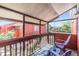 Screened balcony with brick facade, outdoor furniture, and views of the complex at 8220 12Th N Way # G, St Petersburg, FL 33702