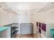 Walk-in closet with installed shelving and ample storage space at 8220 12Th N Way # G, St Petersburg, FL 33702