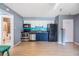 Cozy kitchen featuring stainless steel appliances and a view to another room at 8220 12Th N Way # G, St Petersburg, FL 33702