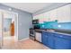 Kitchen with stainless steel appliances and wood floors at 8220 12Th N Way # G, St Petersburg, FL 33702