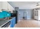 Open floorplan with the kitchen flowing into the living room at 8220 12Th N Way # G, St Petersburg, FL 33702