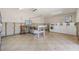 Well-lit community laundry room with multiple washers and dryers at 8220 12Th N Way # G, St Petersburg, FL 33702
