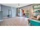 Cozy living room featuring a sliding glass door leading to the patio at 8220 12Th N Way # G, St Petersburg, FL 33702
