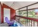 Patio with outdoor seating and view of the mature trees and community green space at 8220 12Th N Way # G, St Petersburg, FL 33702