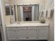 Well-lit bathroom vanity with ample counter space and storage, offering practical elegance at 8765 Bardmoor Blvd # 108, Seminole, FL 33777