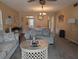 Comfortable living area featuring neutral walls, plush furniture, and a ceiling fan at 8765 Bardmoor Blvd # 108, Seminole, FL 33777