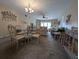 Open floor plan of living and dining area with modern furniture and decor at 8765 Bardmoor Blvd # 108, Seminole, FL 33777