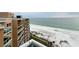 Beautiful view of the beachfront near building, featuring the words 