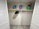 Walk-in closet with white shelving and space for storage at 880 Mandalay Ave # C1103, Clearwater Beach, FL 33767