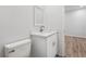This pristine bathroom features a modern vanity with sleek hardware and tile flooring at 9402 Woodbay Dr, Tampa, FL 33626