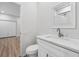 The bathroom features modern fixtures and a view into another room at 9402 Woodbay Dr, Tampa, FL 33626