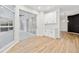 Bright dining area with wood flooring, large windows and sliding glass door leading to outdoor area at 9402 Woodbay Dr, Tampa, FL 33626