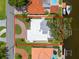 Aerial view of home site showing the brick driveway, canal access and proximity to neighbors at 715 45Th Ne Ave, St Petersburg, FL 33703