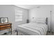 Simple bedroom with lots of natural light, and classic fixtures providing a cozy and functional space at 10213 Westport Ct, Tampa, FL 33615