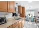 Bright kitchen area featuring a breakfast nook with barstool seating at 10213 Westport Ct, Tampa, FL 33615
