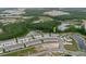 A new community located near a lake and surrounded by trees at 11054 Crescent Deer Dr, Land O Lakes, FL 34638