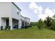 Home with a spacious backyard and covered patio at 11054 Crescent Deer Dr, Land O Lakes, FL 34638