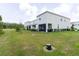 A spacious backyard and covered patio at 11054 Crescent Deer Dr, Land O Lakes, FL 34638