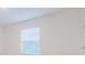 Neutral bedroom featuring a bright window at 11054 Crescent Deer Dr, Land O Lakes, FL 34638