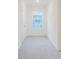 Cozy bedroom with a window and neutral color scheme at 11054 Crescent Deer Dr, Land O Lakes, FL 34638