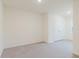 Bright bedroom featuring neutral carpeting and ample closet space at 11054 Crescent Deer Dr, Land O Lakes, FL 34638