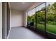 Covered porch with screens at 11054 Crescent Deer Dr, Land O Lakes, FL 34638