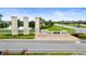 Pradera's neighborhood stone signage, water feature, and landscaping provide an inviting entrance at 11719 Tetrafin Dr, Riverview, FL 33579